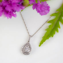 Beauticians Behold Diamond Pendant